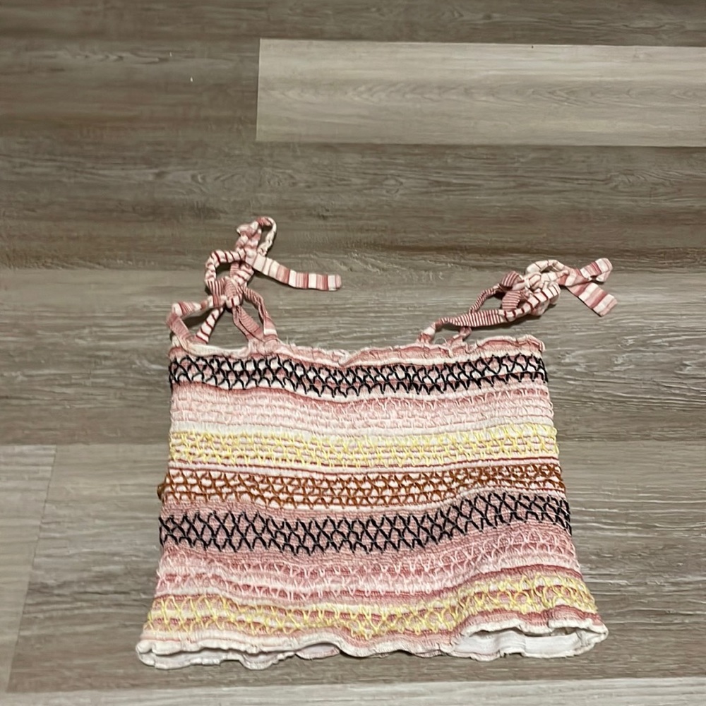 cute beachy tank top. adjustable bow straps. shipping not included
